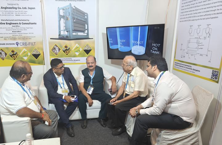 Discussing MIURA's Gravity Super Filter with visitors at the CEAC stall