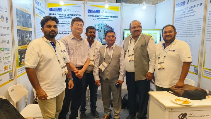 Group photo with visitors at the CEAC stall